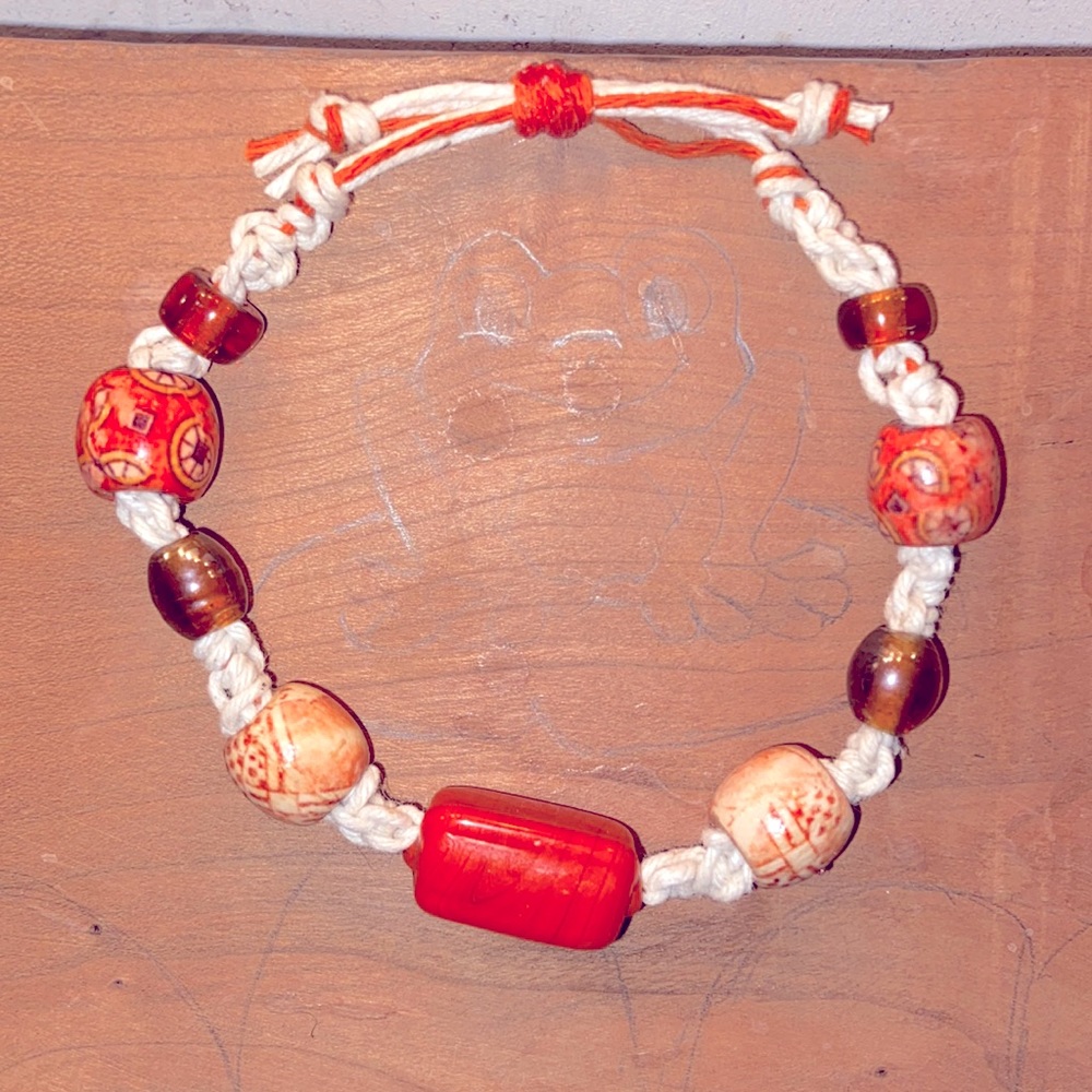 Hemp braided bracelet with glass and wood beads